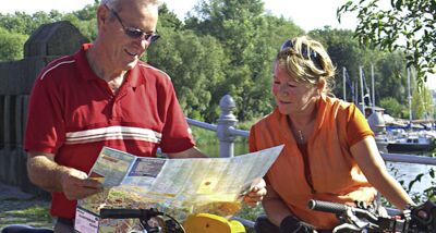 Cyclists with touring map